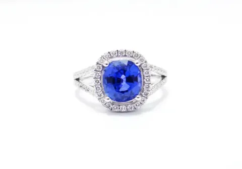 3-carat Ceylon sapphire ring surrounded by diamonds