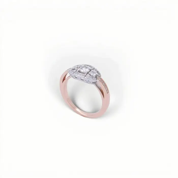 Bague de style Art déco en or rose et blanc 18 carats sertie de trois diamants et d'un pavage de diamants