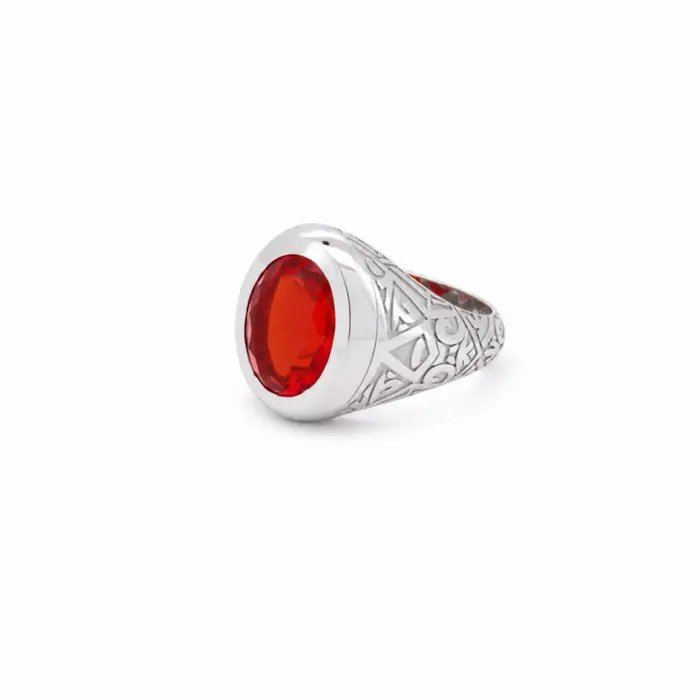 Chevalière en or blanc 18 carats sertie d'un rubis ovale en serti clos, bague homme aux motifs ajourés d'inspiration orientale et au style raffiné.
