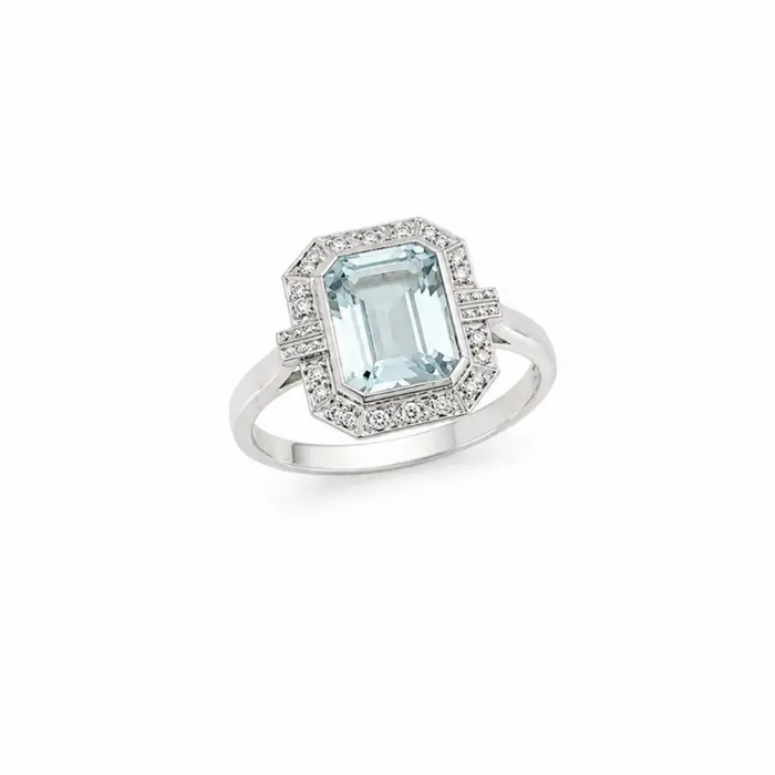 Bague Art Déco en or blanc 18 carats avec topaze bleue et pavage de diamants, bijou de haute joaillerie réalisé par Maupas-Sehikyan.