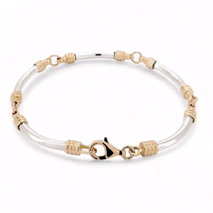 Bracelet bicolore en or jaune et argent avec maillons tubulaires et fermoir mousqueton