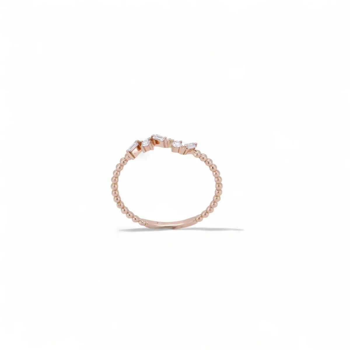 bague diamants baguette et rond en or rose
