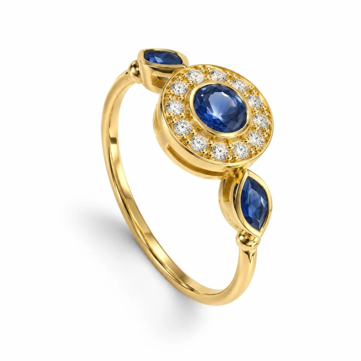 Bague en or jaune 18 carats avec saphir bleu central et entourage de diamants, création joaillière à Nantes