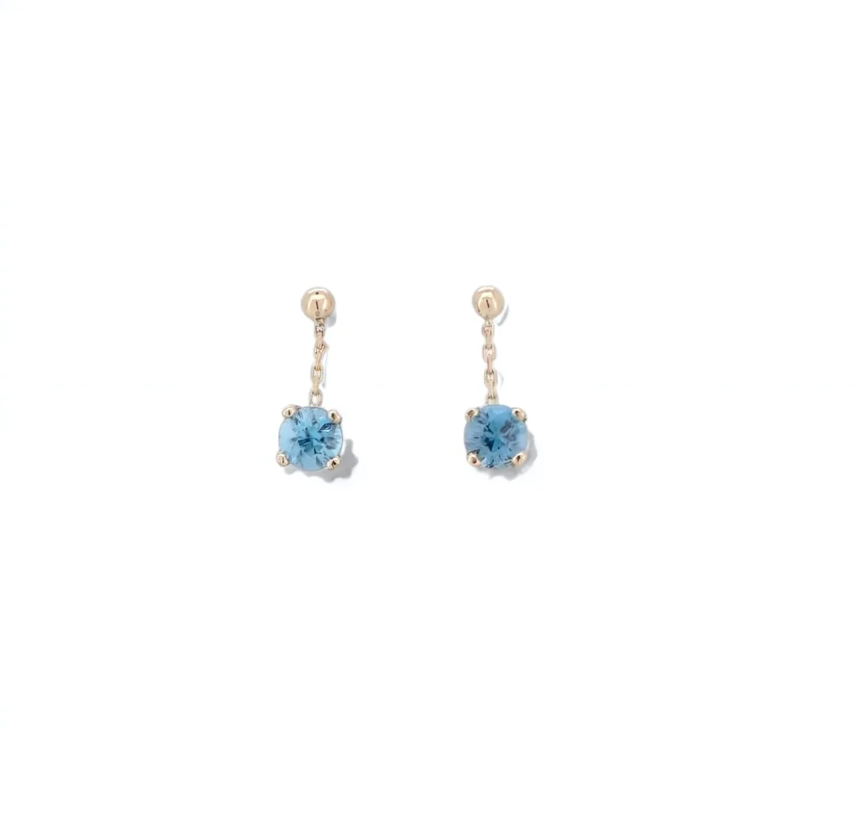 boucles d oreilles pendante or jaune et zircon bleu