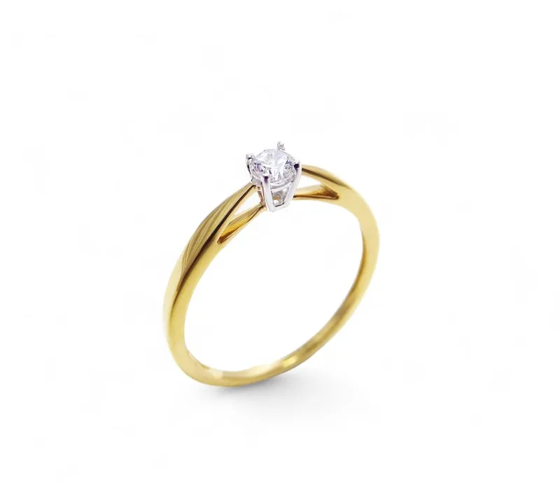 bague deux ors blanc et jaune 18 carats serti d un diamants sur 4 griffes