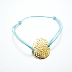 bracelet rosace en or jaune et cordon polyester bleu