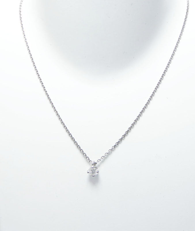 Collier solitaire diamant 0.25 carats  or blanc  750.