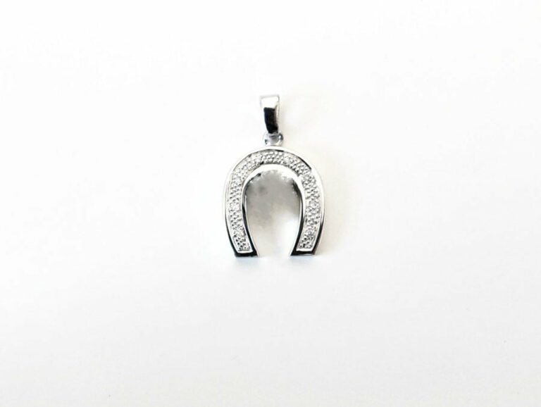 Pendentif fer a cheval, diamants.