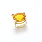 grosse bague citrine 12/8m serti en griffes et deus ceur cirtine serti deux griffes