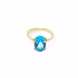 bague topaze bleue ovale monture or chaton 4 griffes