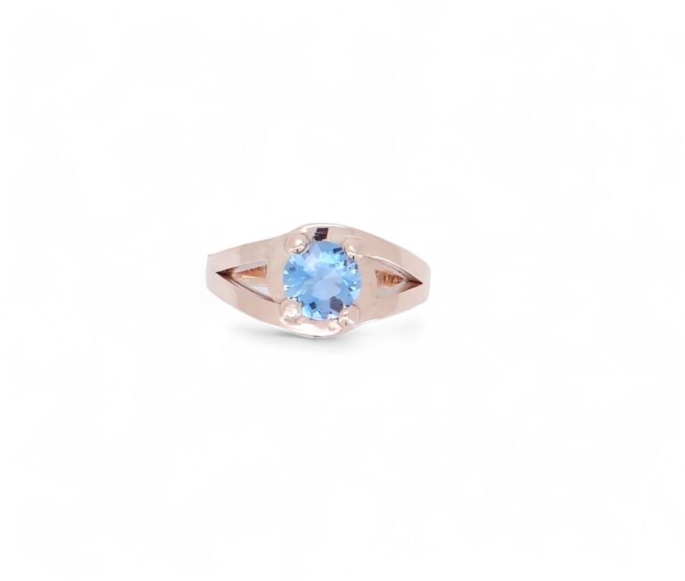 Solitaire Tourbillon en Or Rose et Aigue-marine