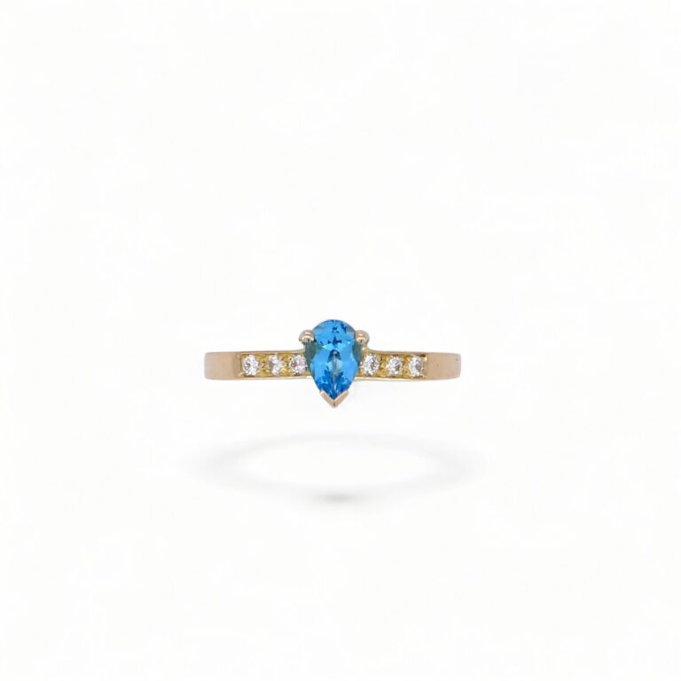 Bague topaze bleu poire et diamants, or jaune 18 carats